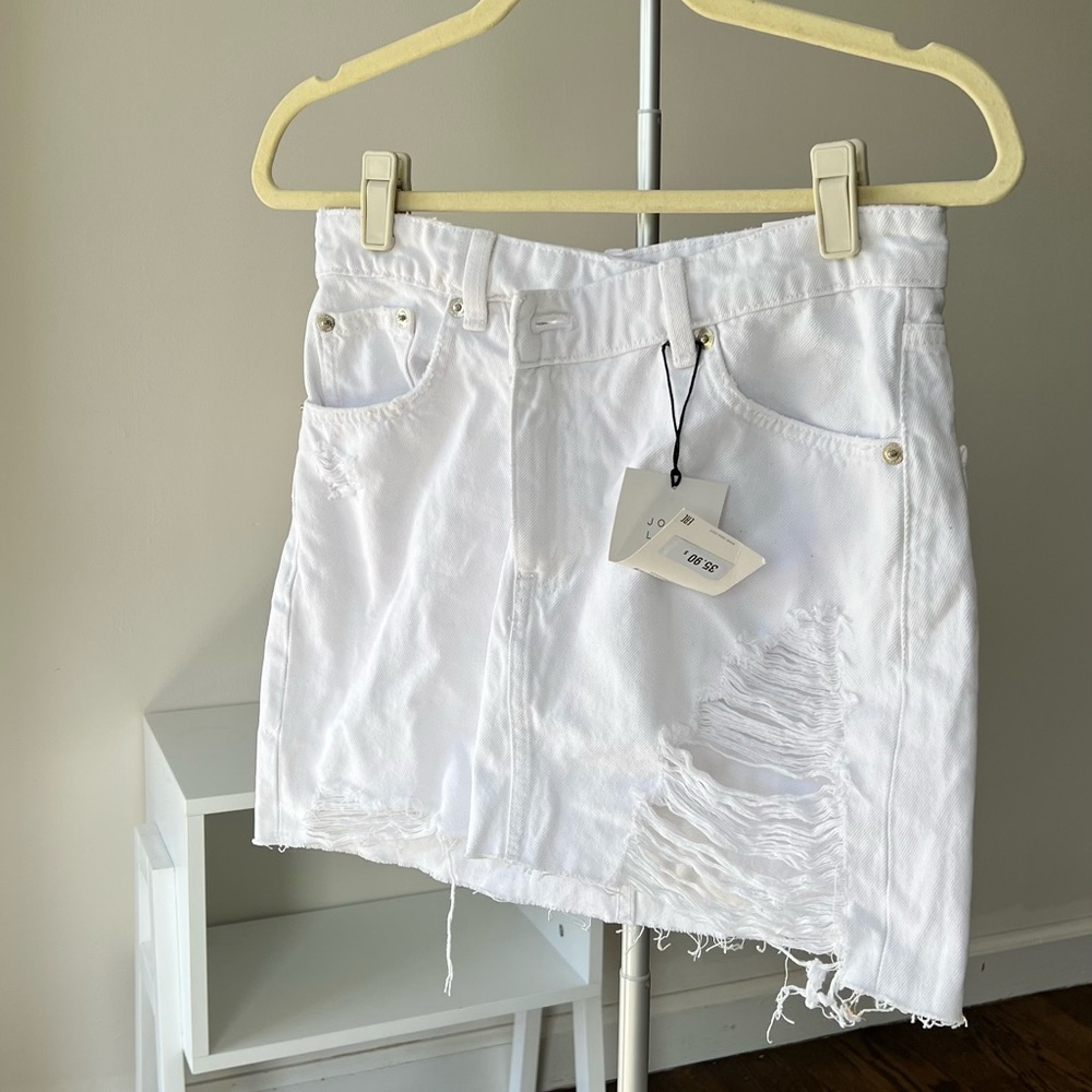 zara white denim high rise skirt with an asymmetrical waist